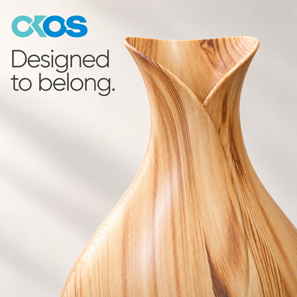 Woodgrain-finish diffuser with sculpted tulip-shaped outlet