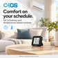 OKOS IR controller in a living room illustrating schedules and configured temperature-based routines.